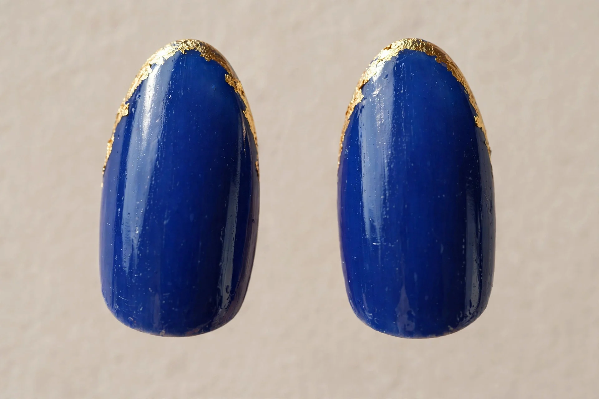almond nails, royal sapphire, gold foil tips