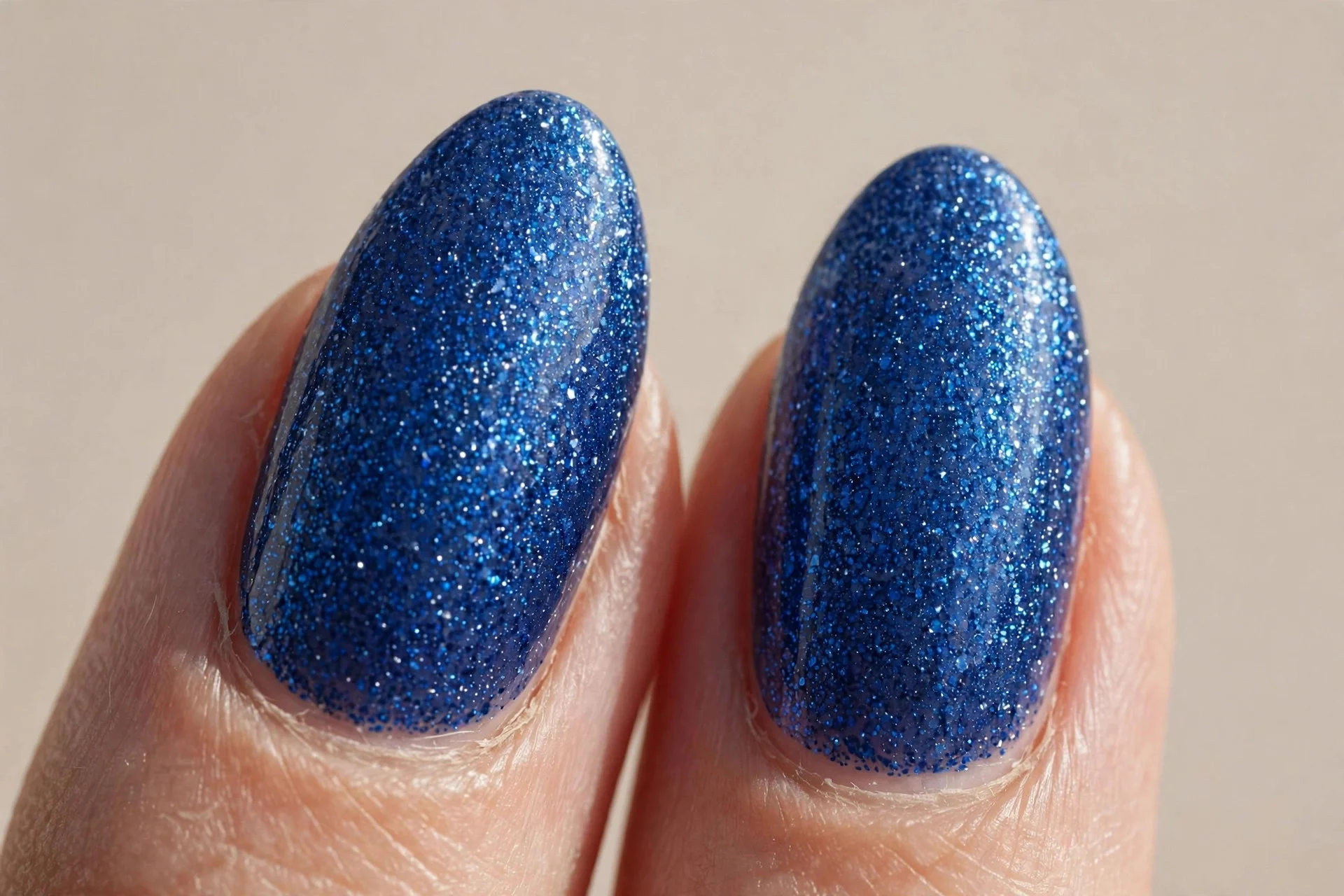 almond nails, sapphire shimmer, sparkling