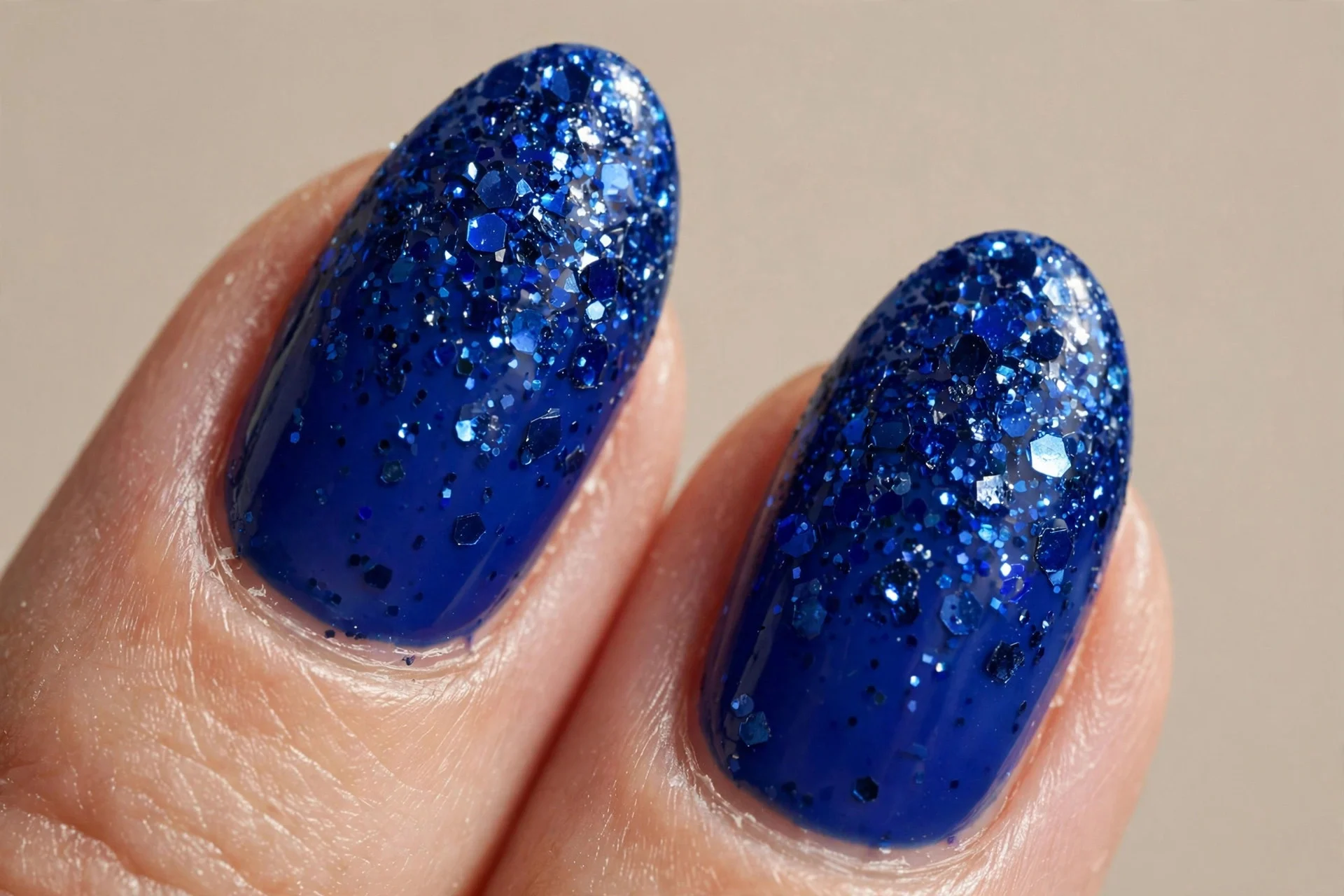 almond nails, royal sapphire, glitter topper