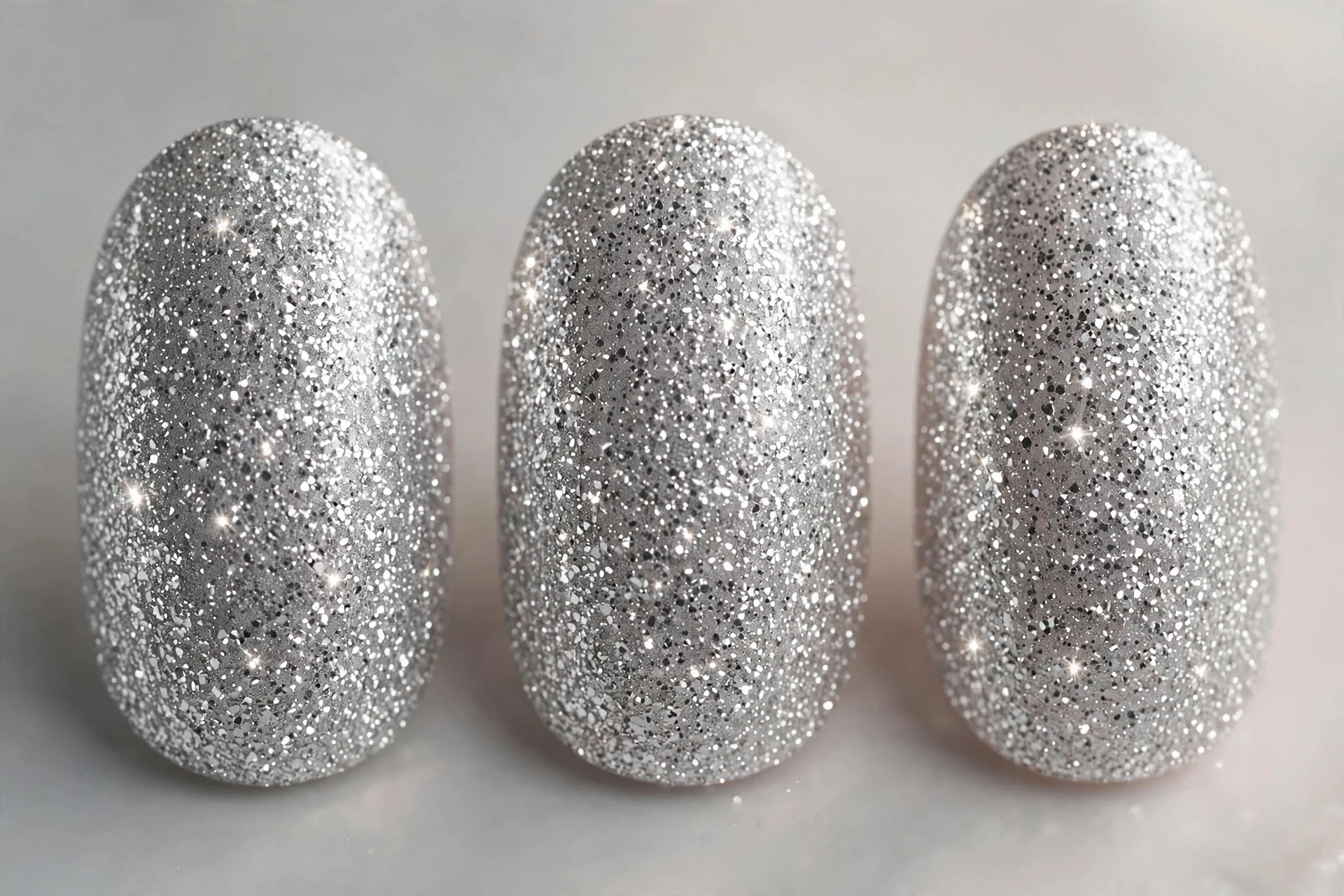 Dense fine silver glitter nails, medium oval, sparkling
