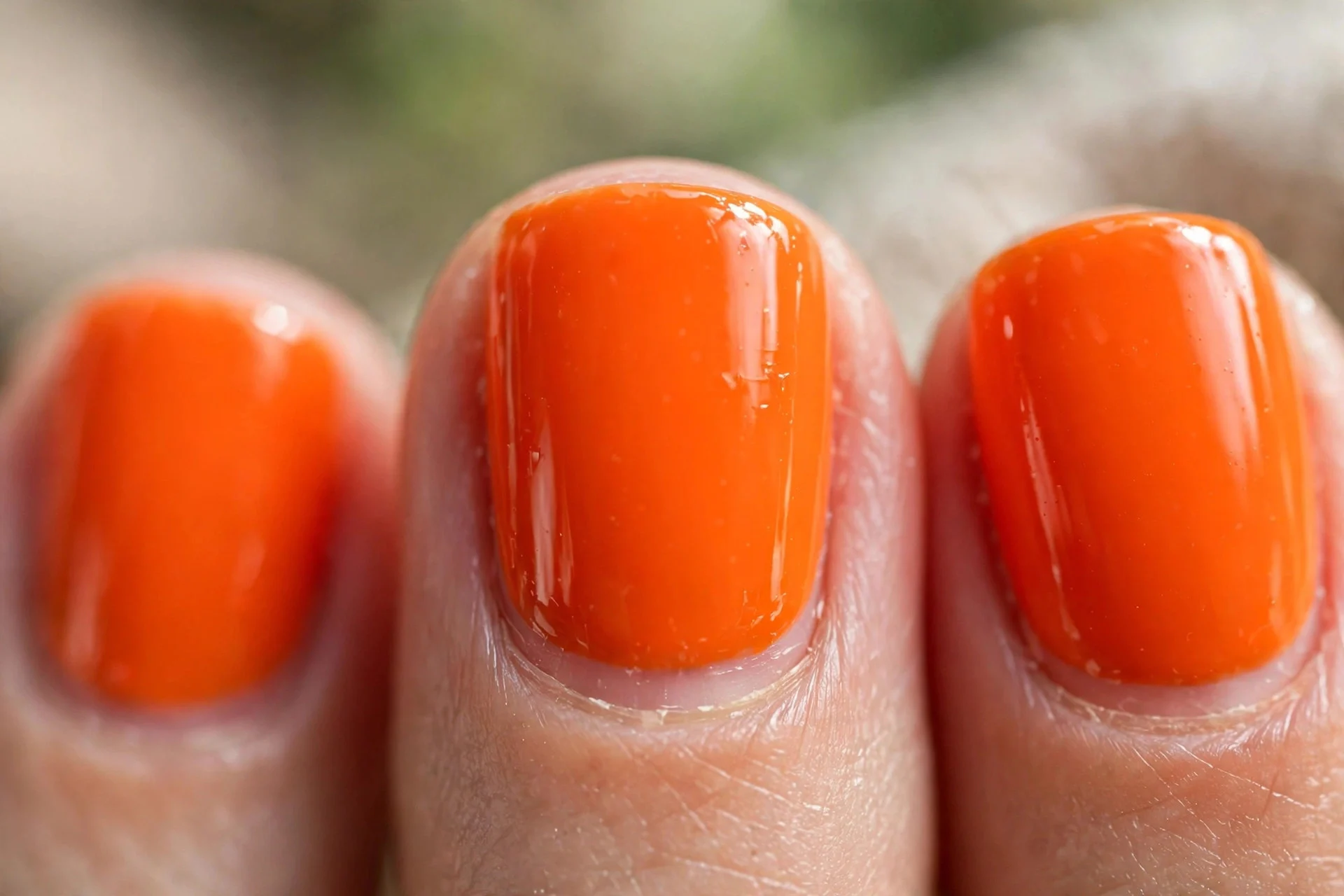 Bright tangerine gel polish, short square nails