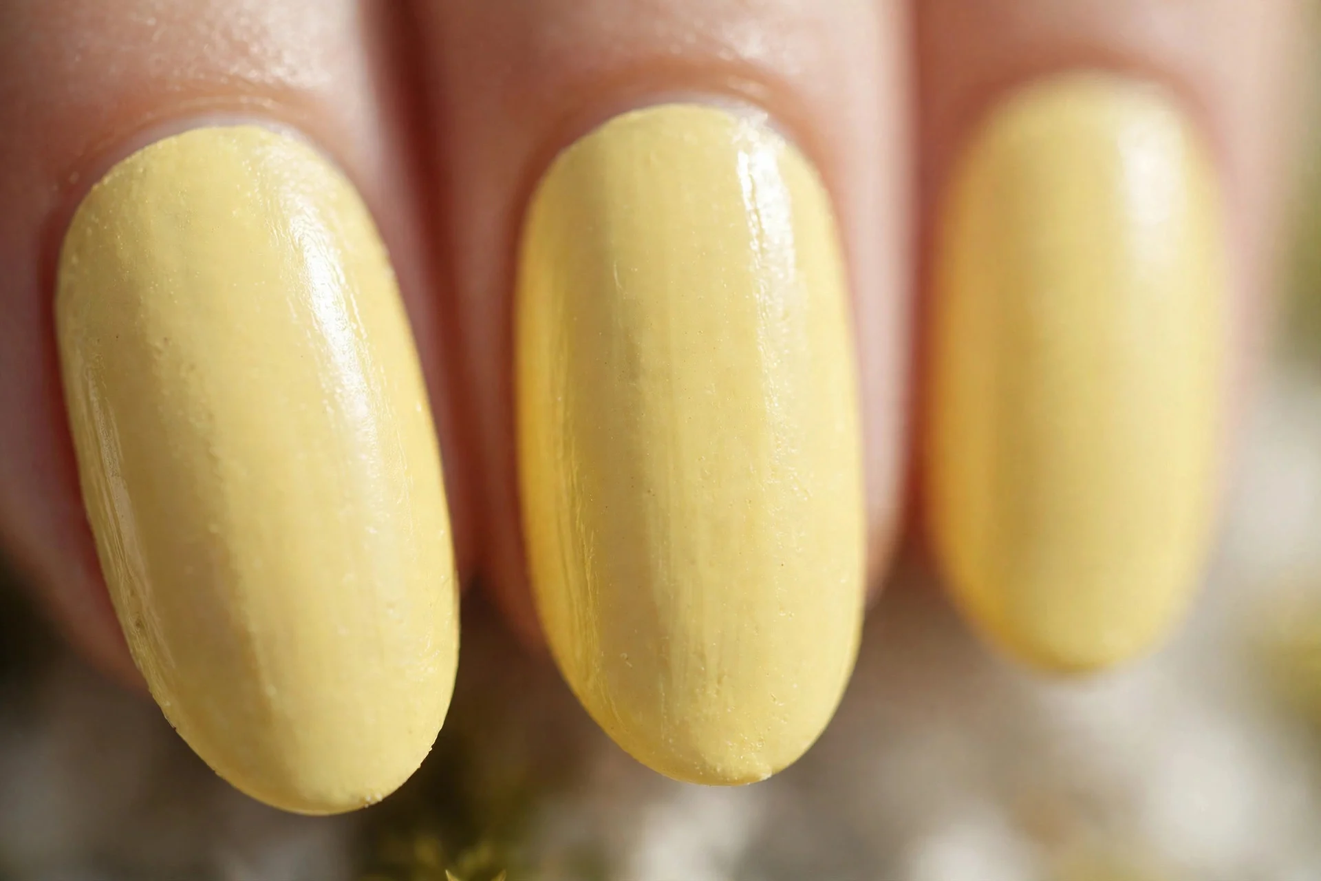 Butter yellow pastel polish, short almond nails