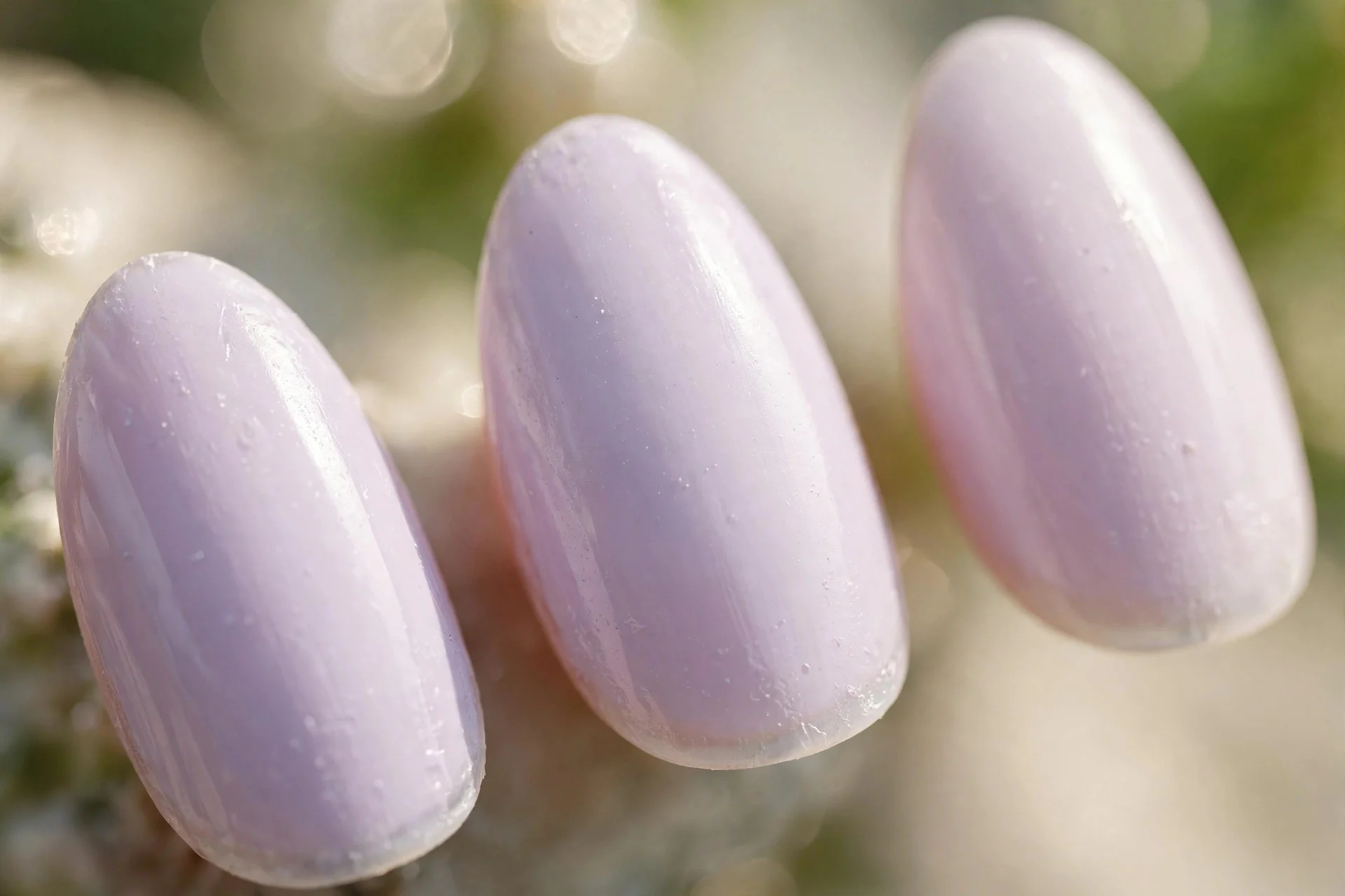 Milky lavender polish, almond nails