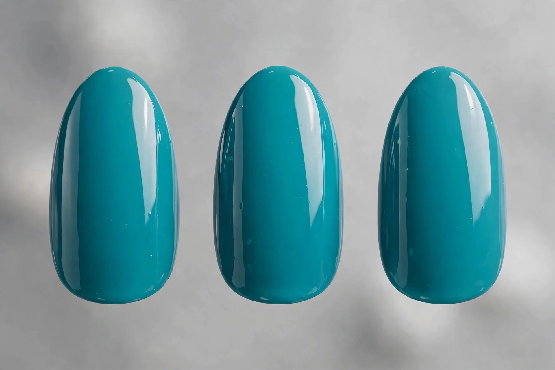 Clear saturated ocean teal polish, medium almond nails, glossy