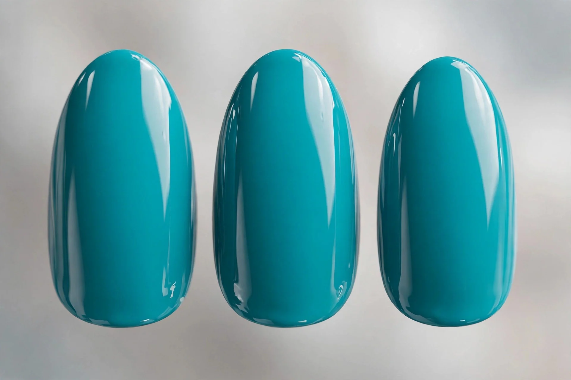 Electric vivid teal polish, medium almond nails, glossy