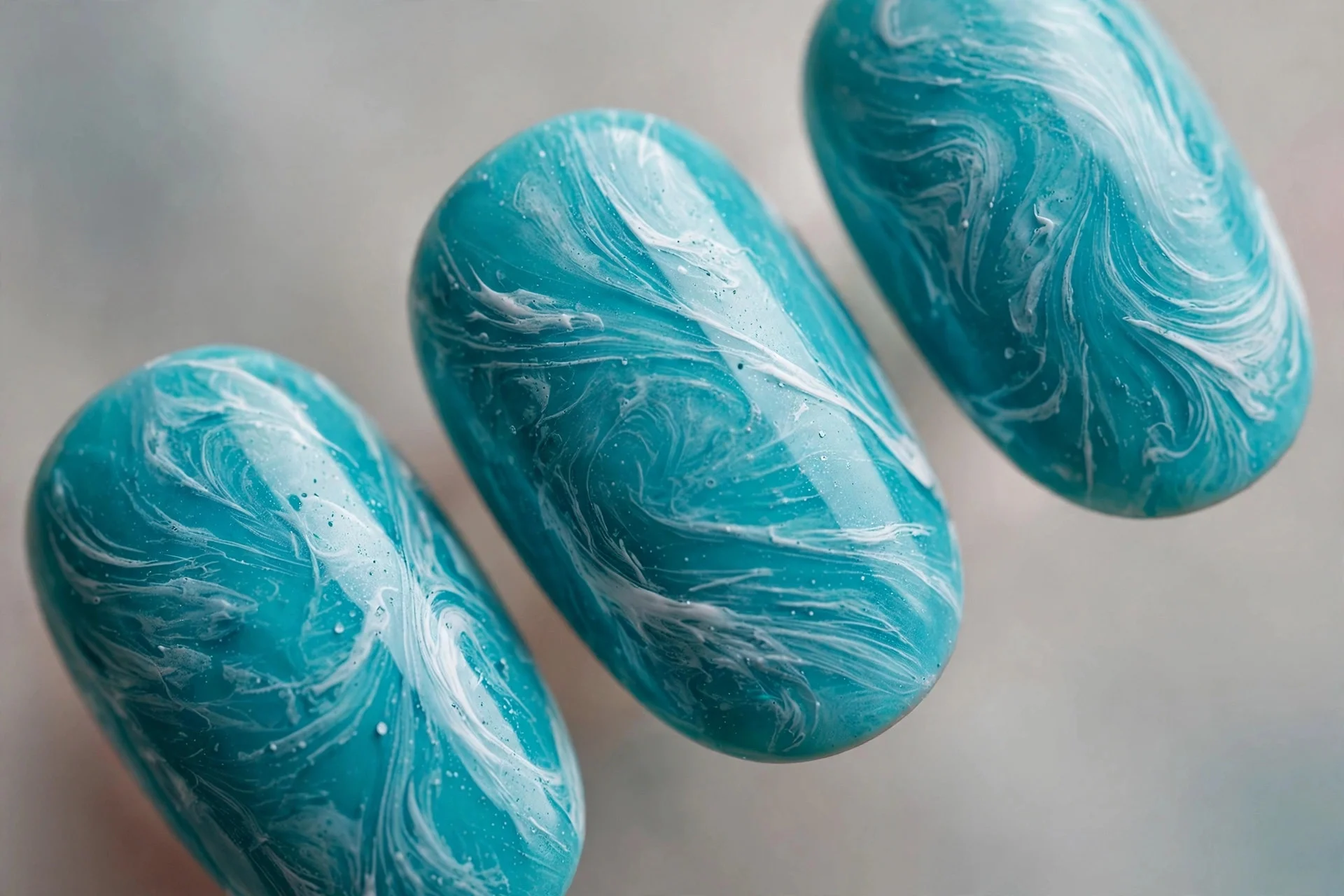Turquoise with white dry-brush marble swirls, oval nails