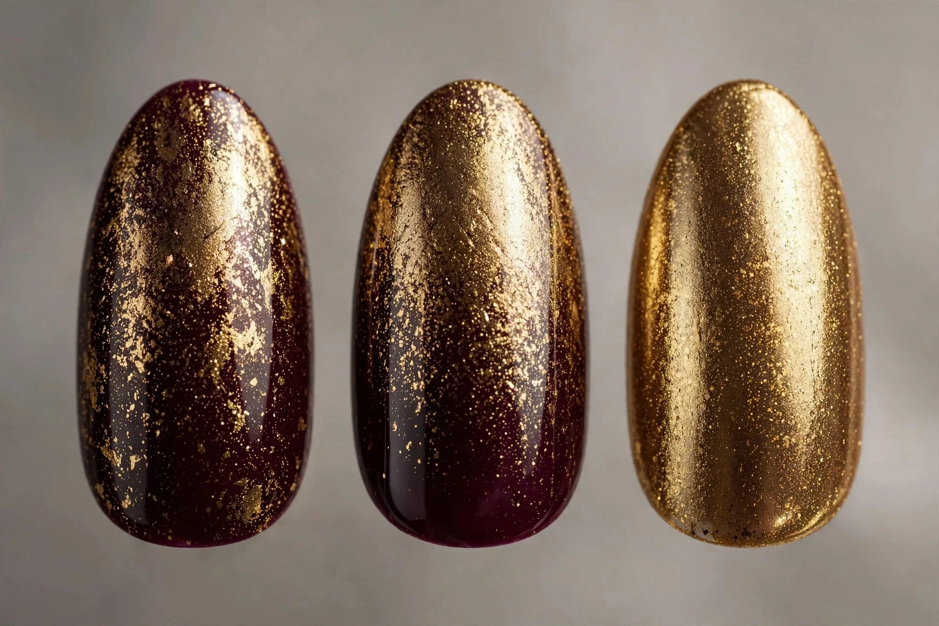 Wine polish with gold chrome powder finish, almond nails, metallic